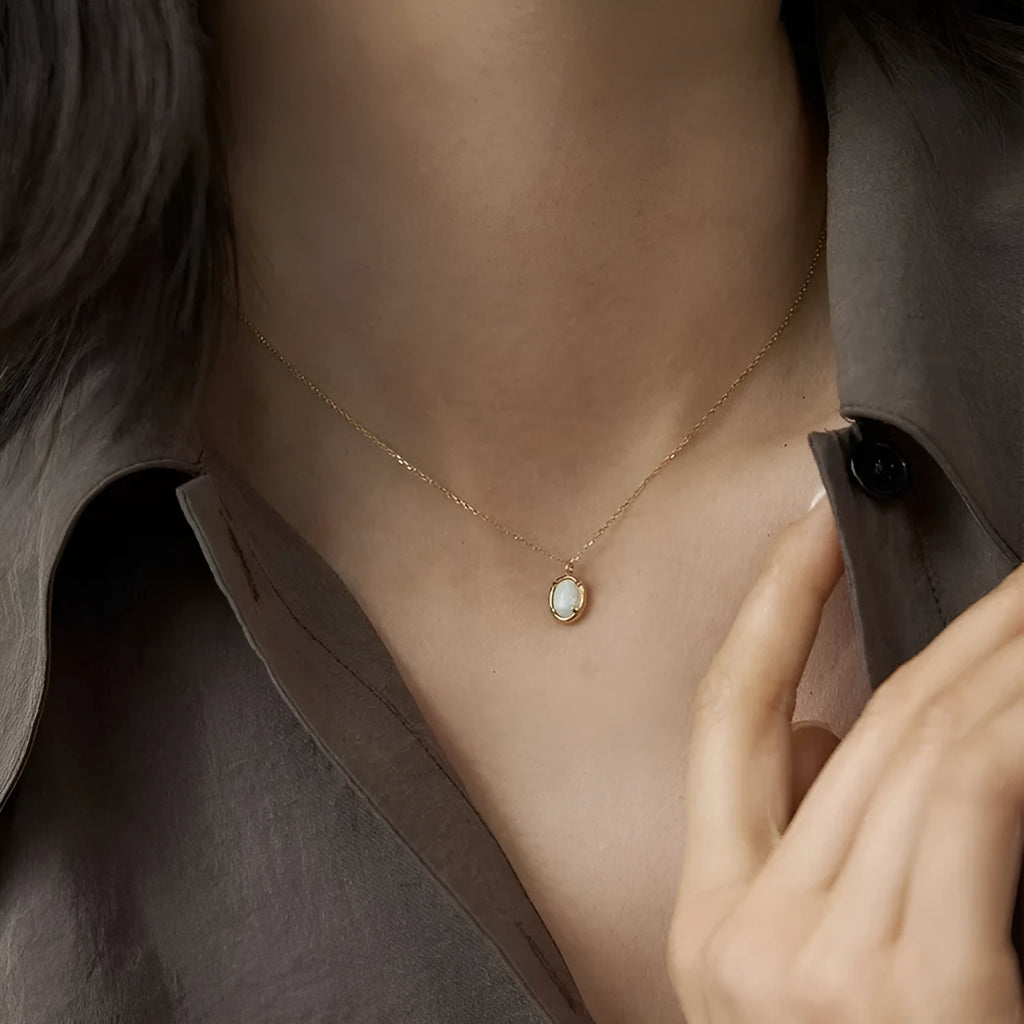 Geometric S925 silver plated pendant necklace with oval jelly opal stone in gold tone setting