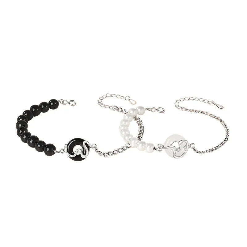 925 sterling silver couple bracelet with snake design, obsidian pearls, and a safe buckle.