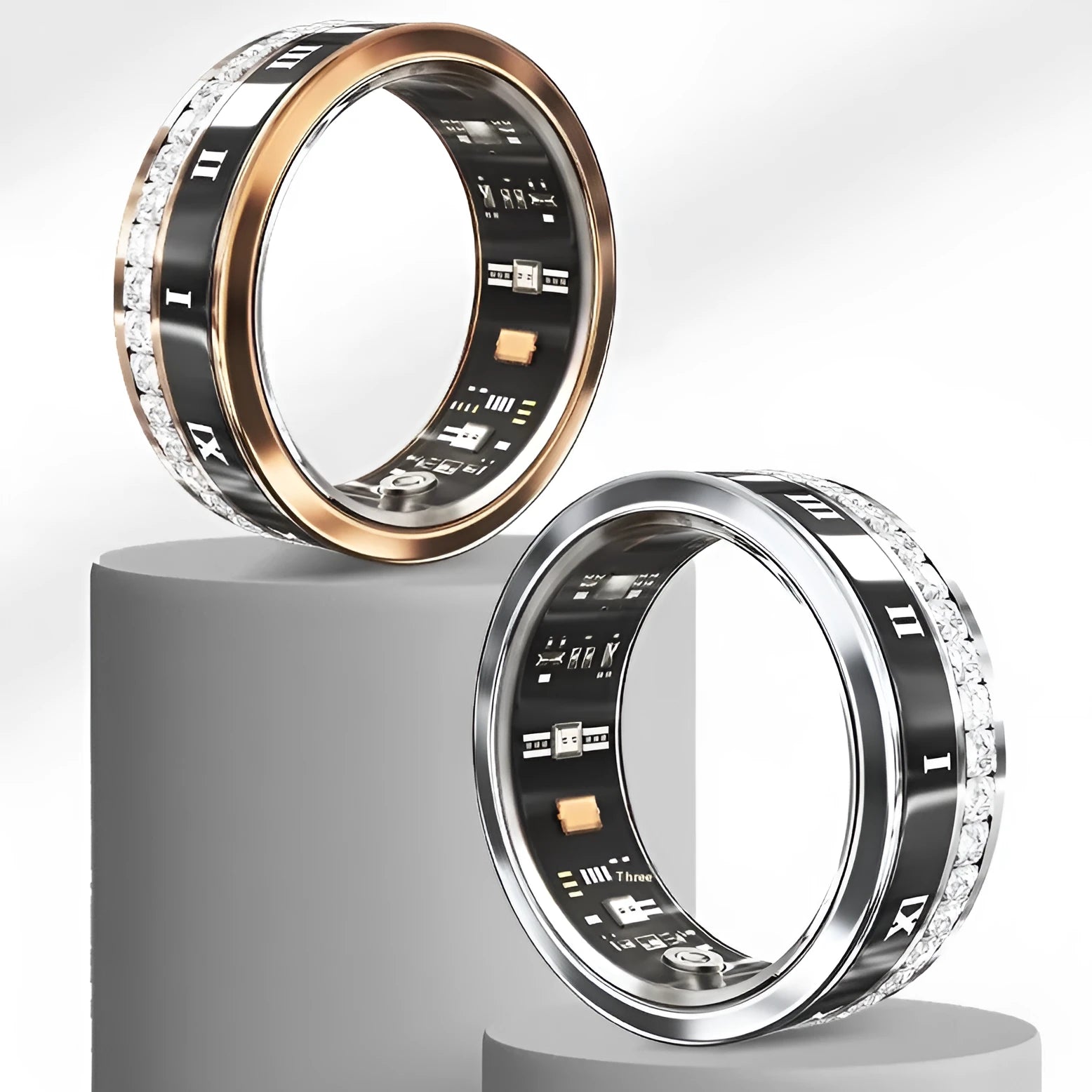 Silver and gold smart ring with diamond inlay on a finger, showing its wearable design and jewellery aesthetic.