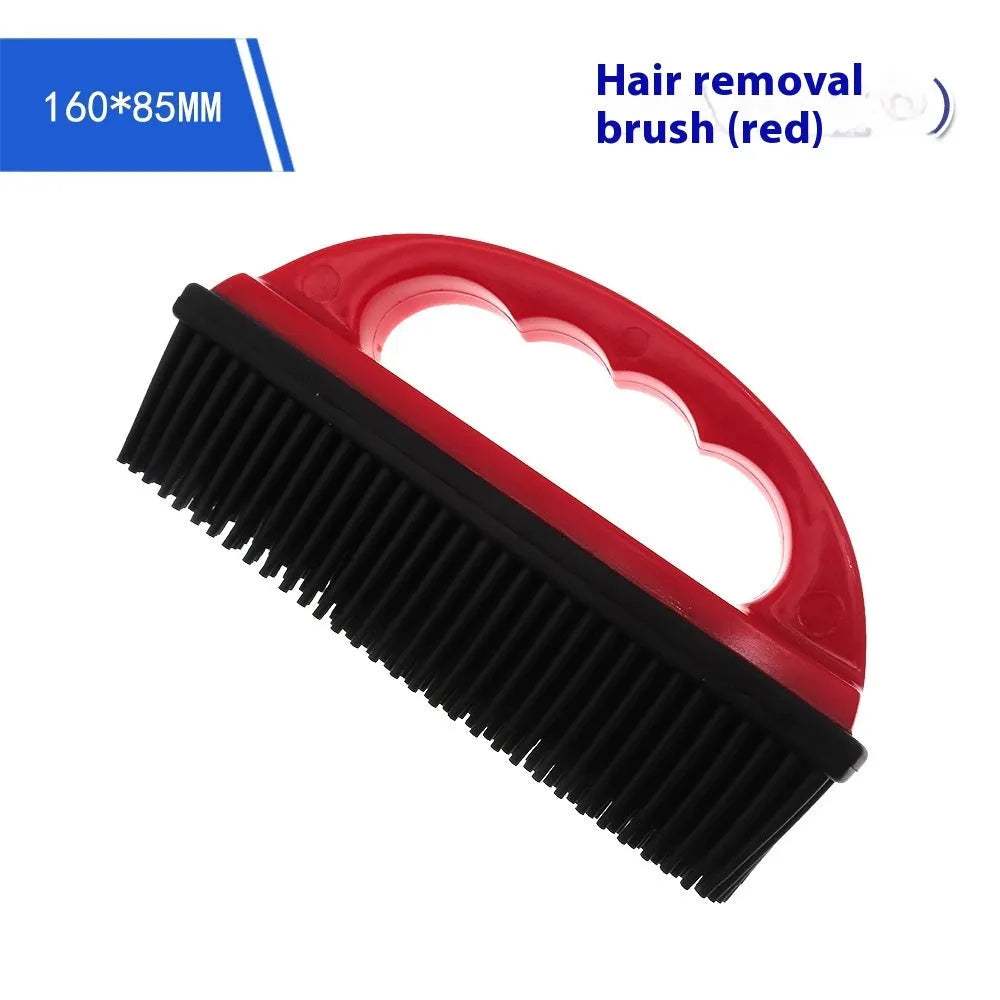 Red pet hair removal and massage brush for grooming and carpet cleaning.