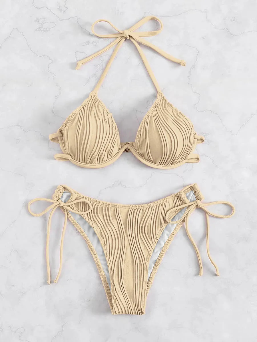 Women's apricot coloured bikini swimsuit with steel underwire bracket on a mannequin.