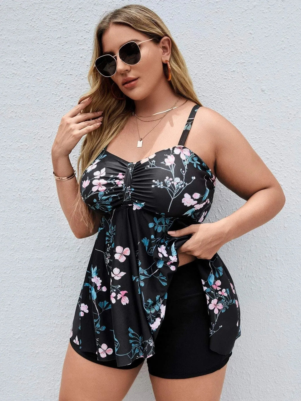 Women's floral print one-piece swimsuit with split colour design in plus sizes.