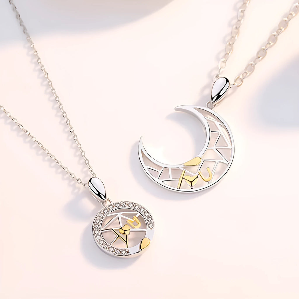 Sun Moon couple necklace set with copper electroplated pendants on a cross chain.
