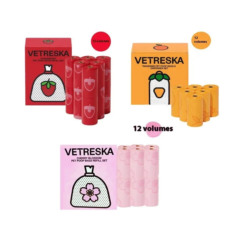 Dog poo bag dispenser capsule with scented refill roll in strawberry pattern design