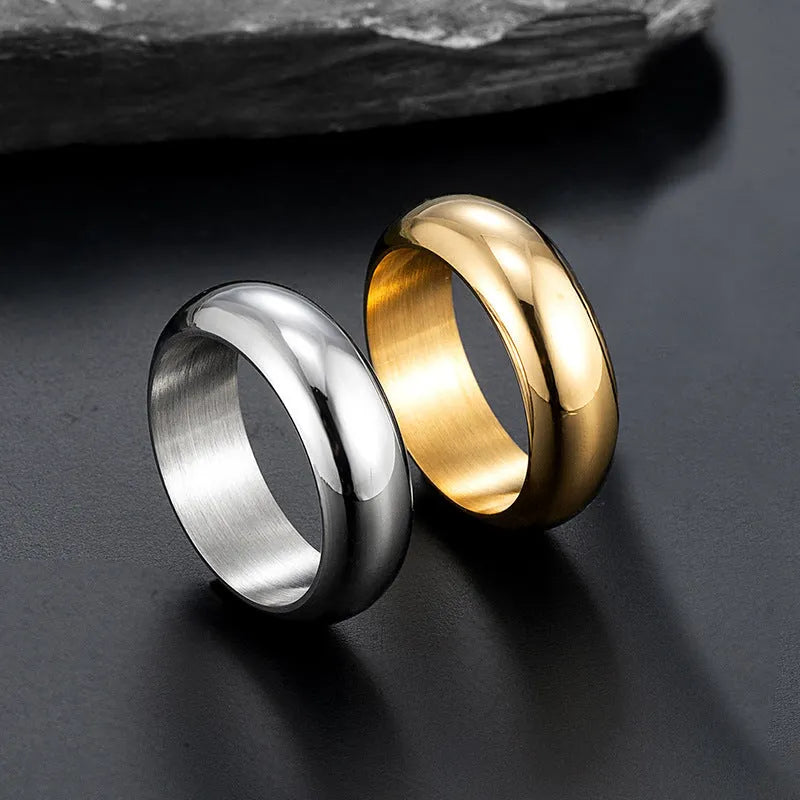 Glossy electroplated titanium steel ring in gold, black or steel colour showing shiny band design.