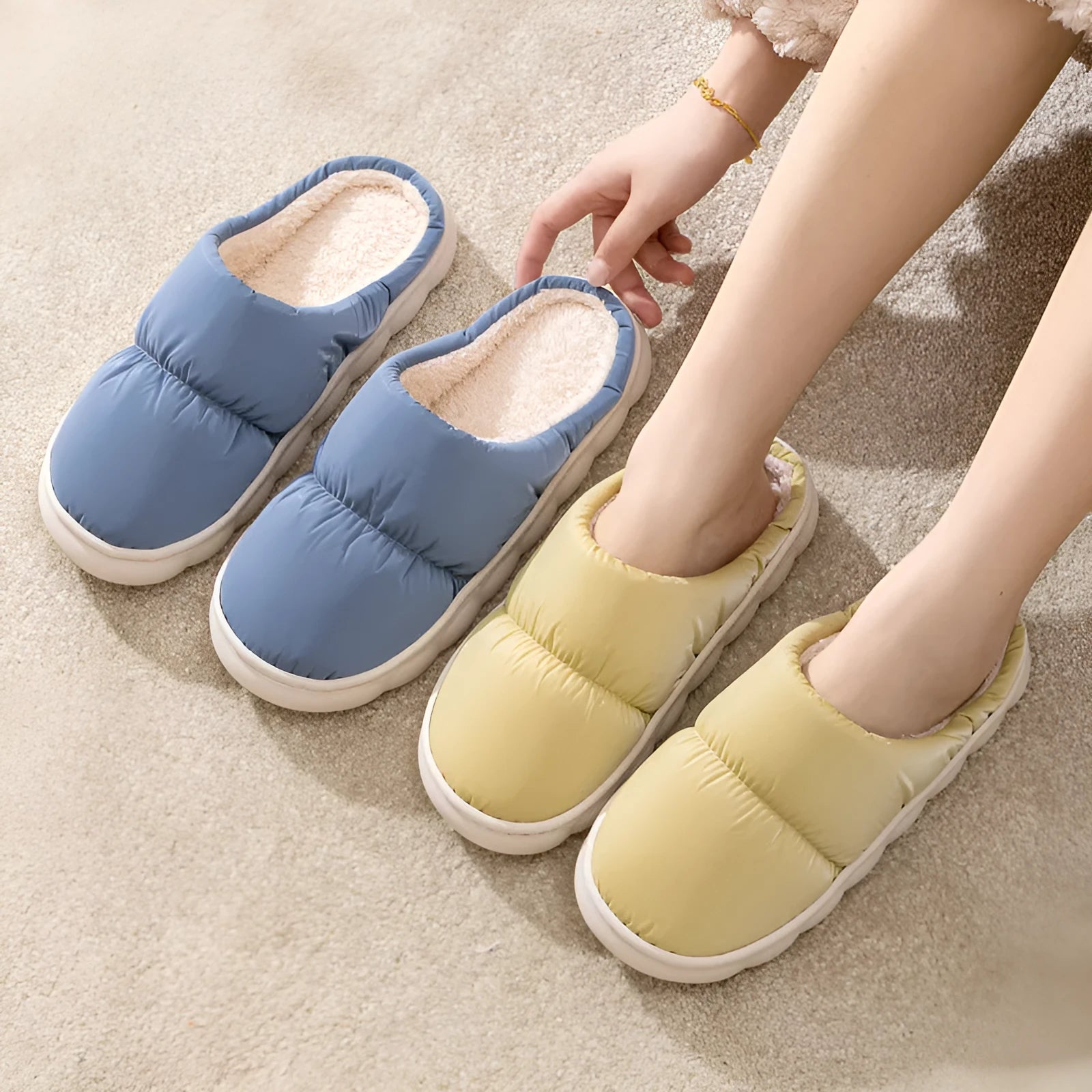 Blue winter slippers with artificial leather upper and thick rubber sole, showing plush lining.