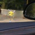 Swing spring bee car decoration made from a fur ball, measuring 3cm by 3cm.