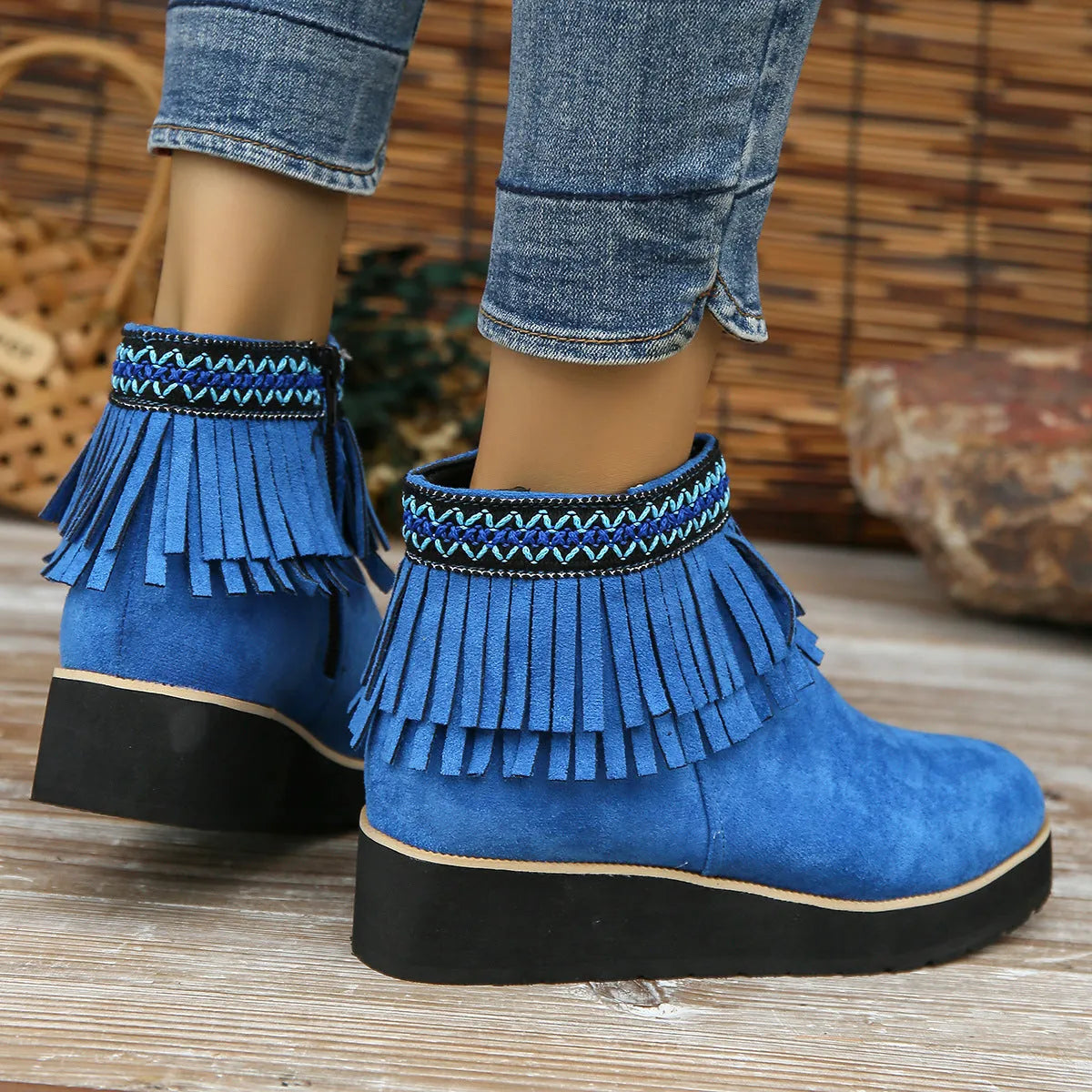 Women's wedge boots with suede upper, waterproof platform, thick rubber sole, side zip, and tassel detail