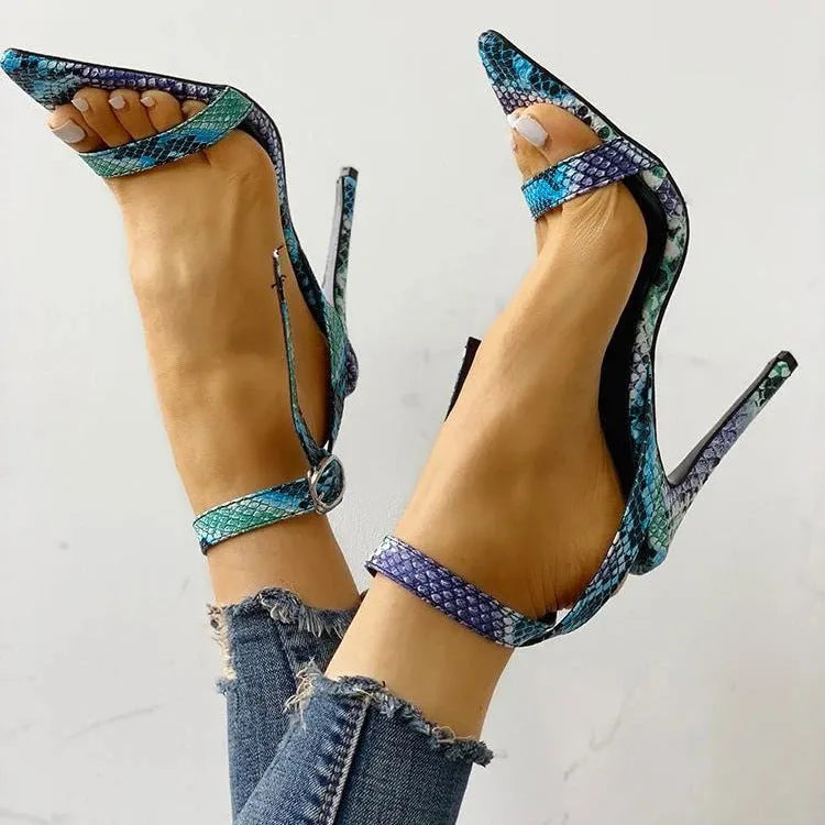 Blue large-size women's heels with buckle fastening and point-toe silhouette