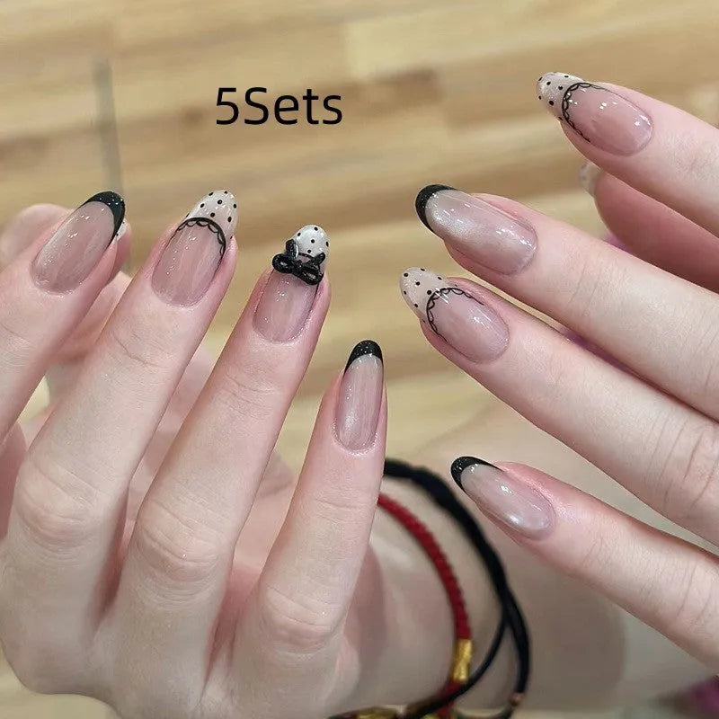 False nails with gel polish finish in assorted colours and patterns