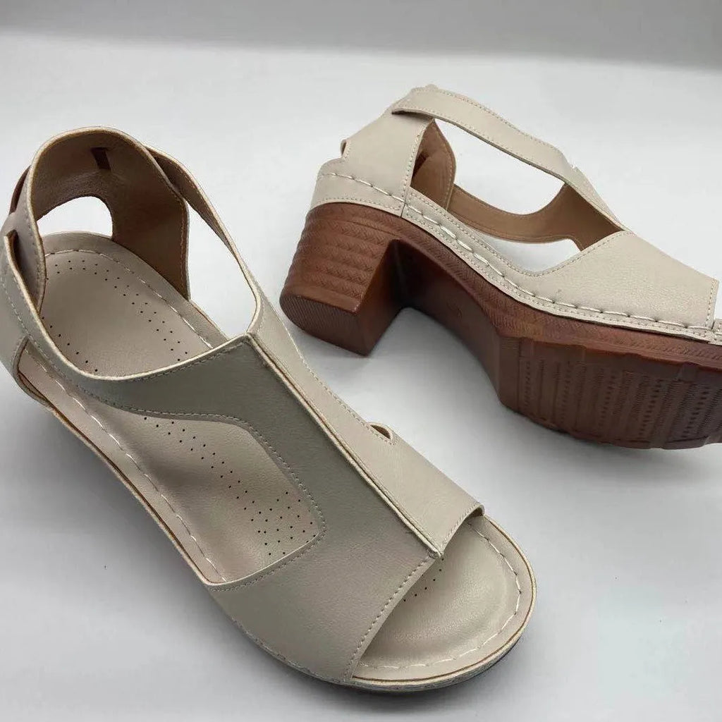 Women's white peep toe wedge sandals with Roman style buckle and low heel