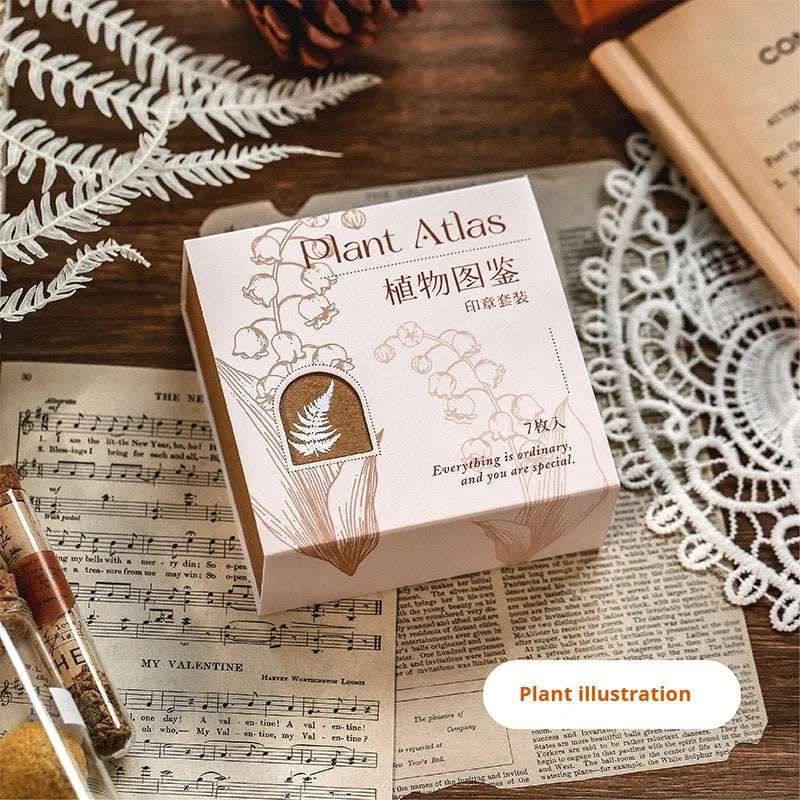 Mr Paper Seal Suit wooden handmade stamp set showing seven pieces with vintage decorative patterns
