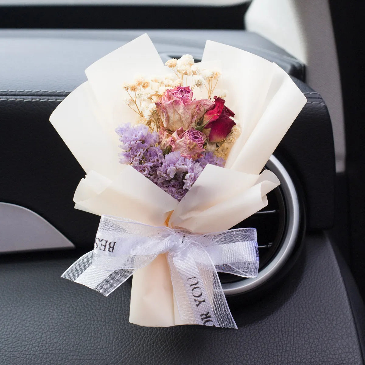 Handmade dried flower car vent ornament with interchangeable scented discs in multiple colour options