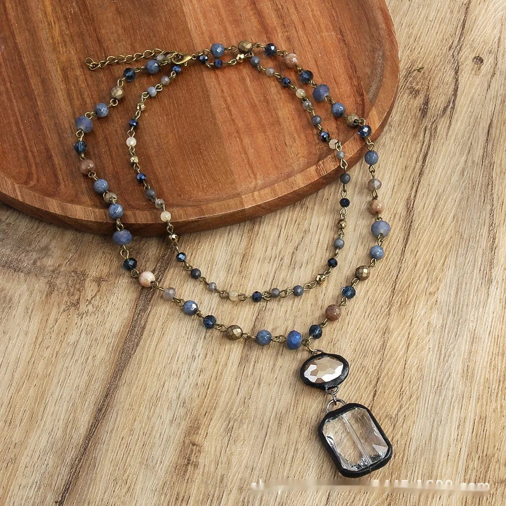 Two-layer tribal necklace with stone and glass pendants on adjustable chain