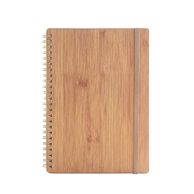 Erasable coil-bound notebook with customisable coloured cover on thick, reusable rock paper, shown with a pen.