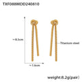 Gold titanium steel long necklace with knotted tassel pendant and matching earrings on a white background.