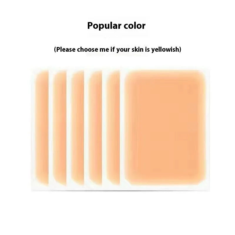 Pack of adhesive tattoo cover patches in various skin tone colours on a white background.