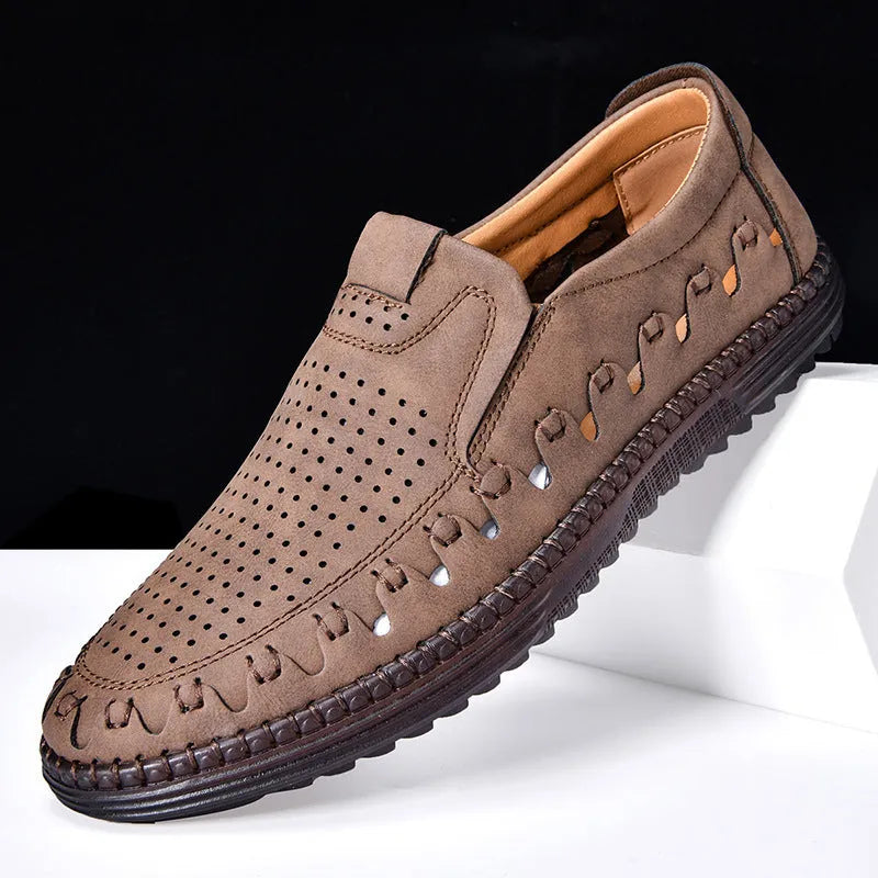 Men's brown slip-on casual shoes with artificial PU upper and visible sewing construction around PVC sole