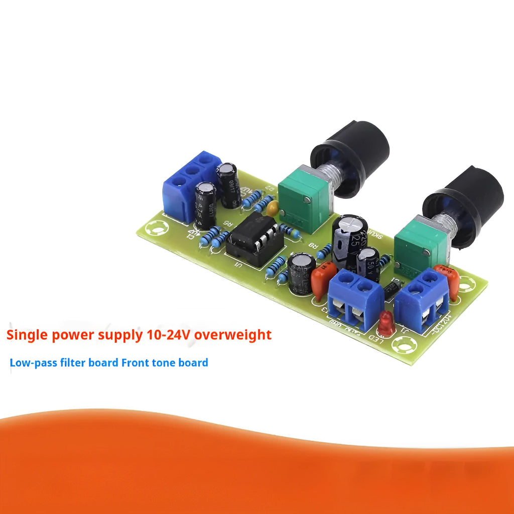 Front stage bass boost circuit board with components mounted on FR-4 fibreglass showing mounting holes and connections