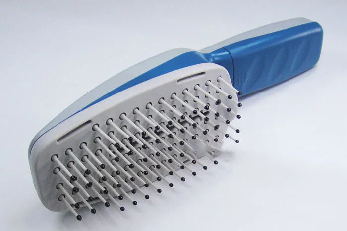 Pet grooming comb with negative ion and active oxygen purification, showing removable brush head and 78 teeth.