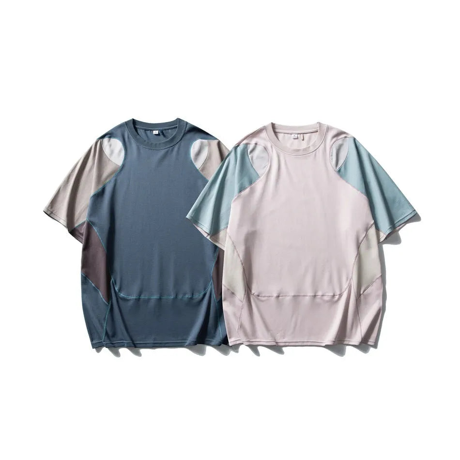 Men's loose-fit patchwork contrast colour T-shirt with raglan short sleeves in cotton blend fabric.