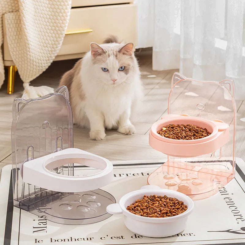 Grey pet bowl with cat ear sides, shown with adjustable height stand and removable cage attachment.