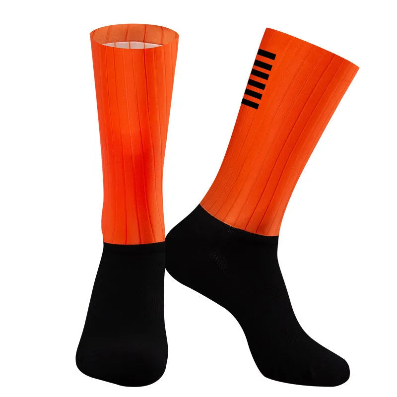 Cycling socks in orange, black, purple, white, grey, or dark blue with moisture-wicking fabric