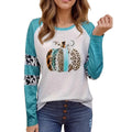 Sky blue long sleeve t-shirt with a large 3D digital printed Halloween pumpkin design on the front.