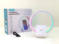 White rectangular Bluetooth speaker with wireless charging pad and ambient lighting