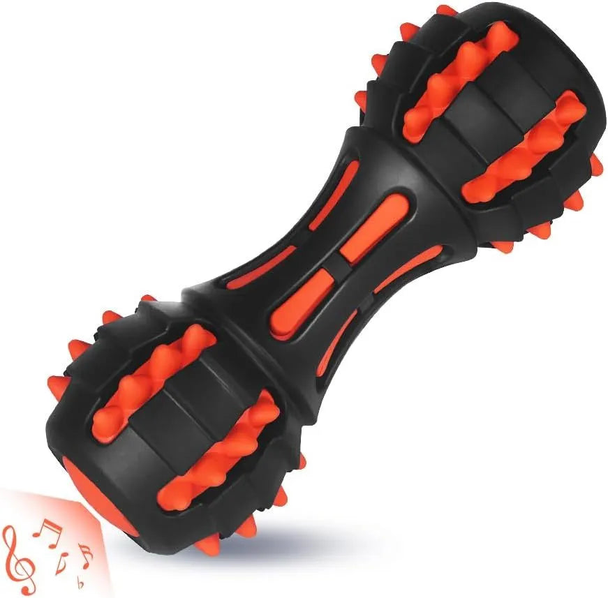 Red dumbbell-shaped natural rubber dog chew toy with squeaker for medium and large breed dogs