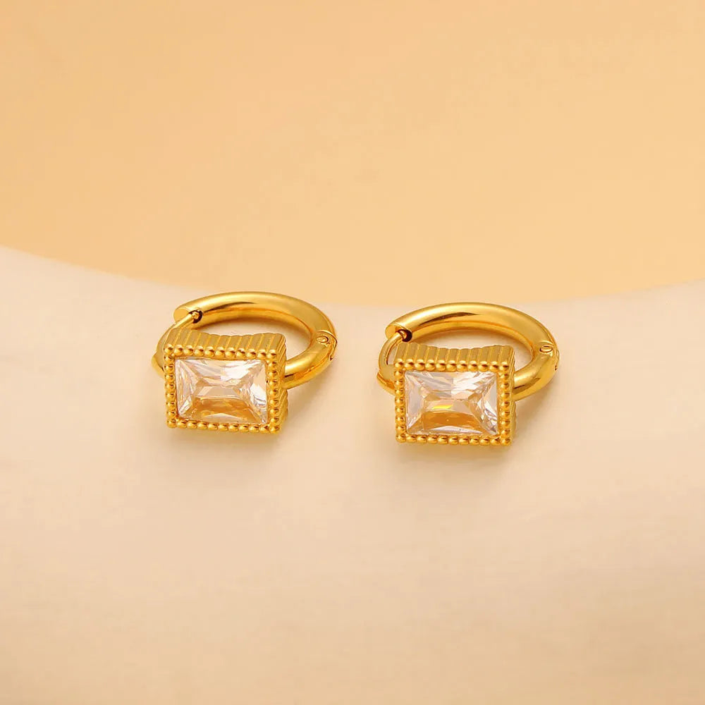 Square geometric design stainless steel earrings with zircon accents in white, black, and green colours.