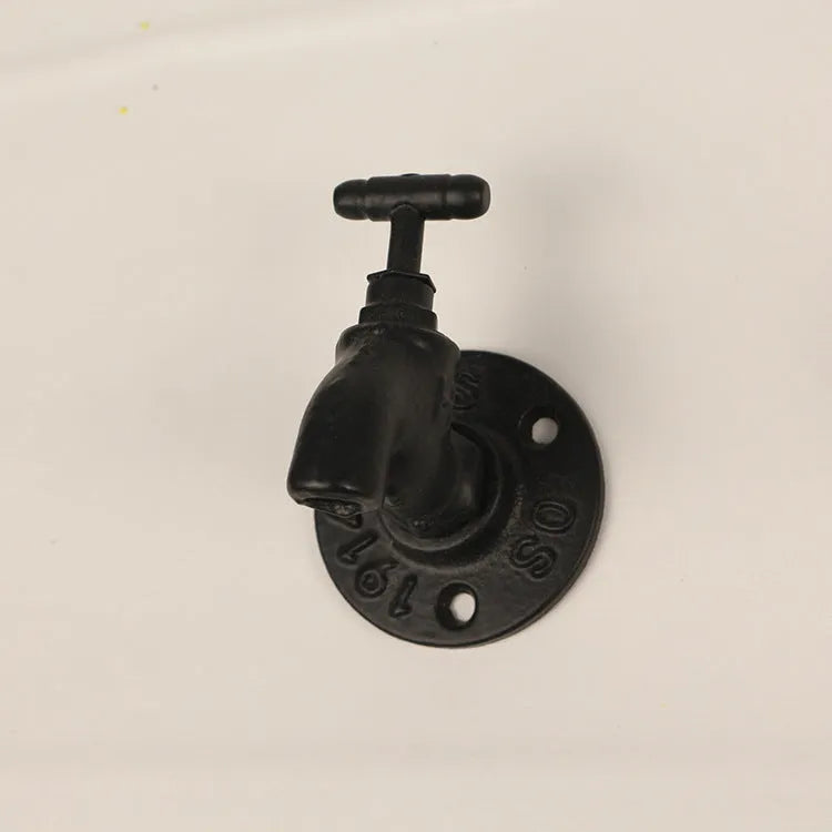 Metal wall hook in water pipe style with polished finish, shown in black, green, and red colour options.