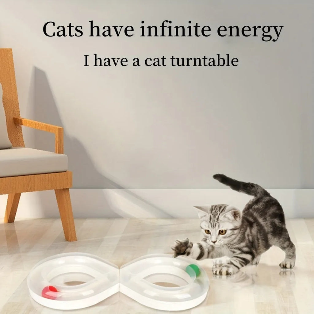 Blue and white circular cat turntable track with four spinning balls and teasing stick for feline play