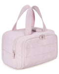 Large lightweight travel toiletry bag in beige with wide open design showing fluffy interior