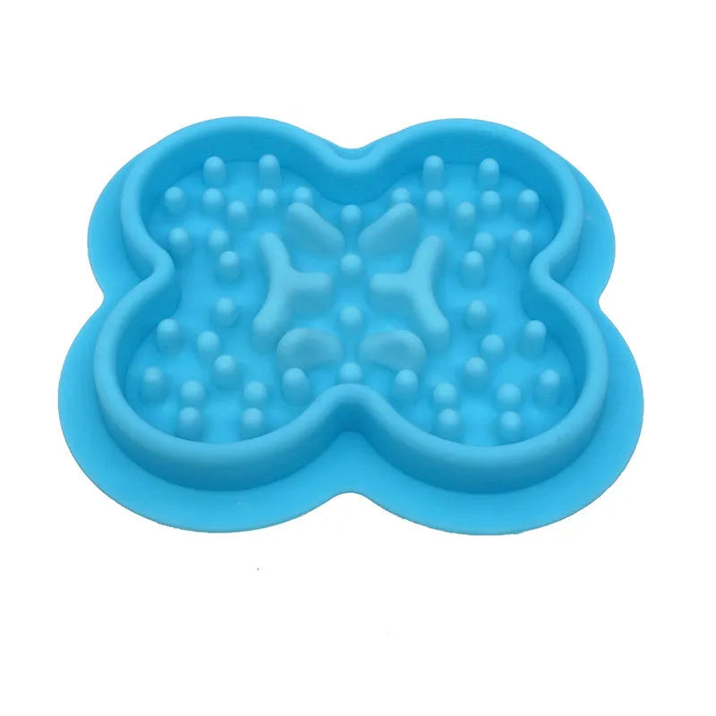 Silicone pet licking pad slow feeder mat in various colours on a flat surface