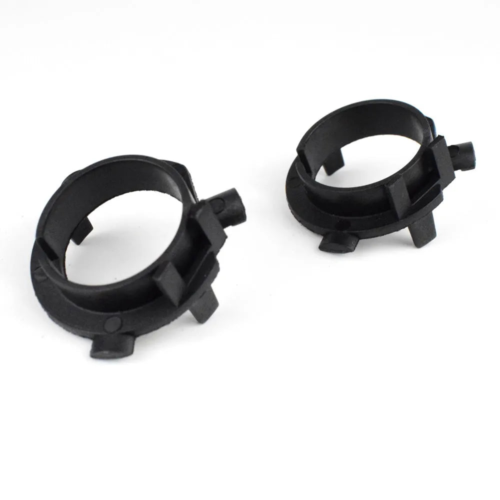 Black ABS plastic card holder for car LED headlight, shown next to a parking card.
