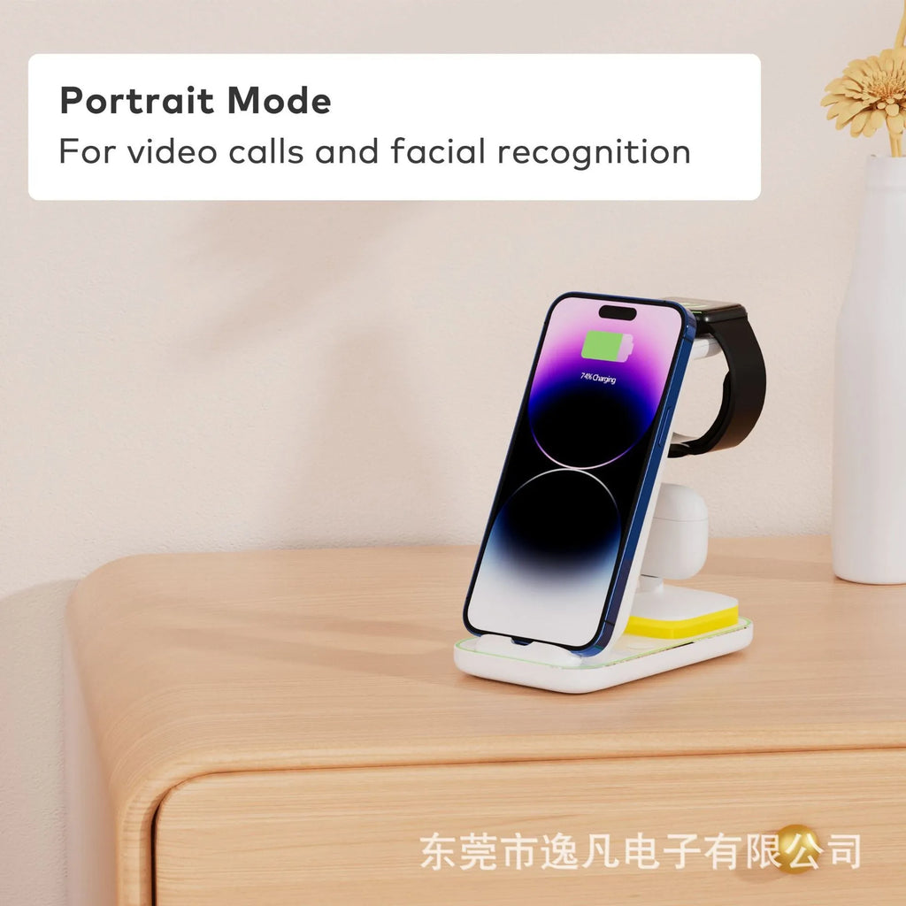 Black vertical wireless charging station with phone, Apple Watch and AirPods charging simultaneously
