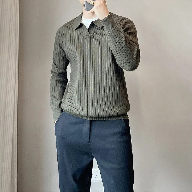 Man wearing a loose grey rabbit fur blend knitted pullover sweater, casual autumn style.