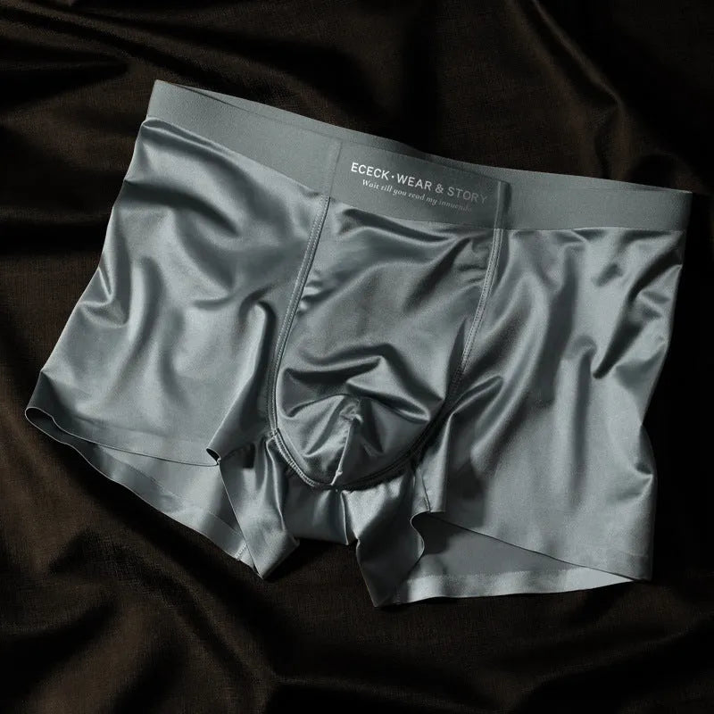 Men's colourblock ice silk seamless underwear in blue, brown, grey, and white colour options.