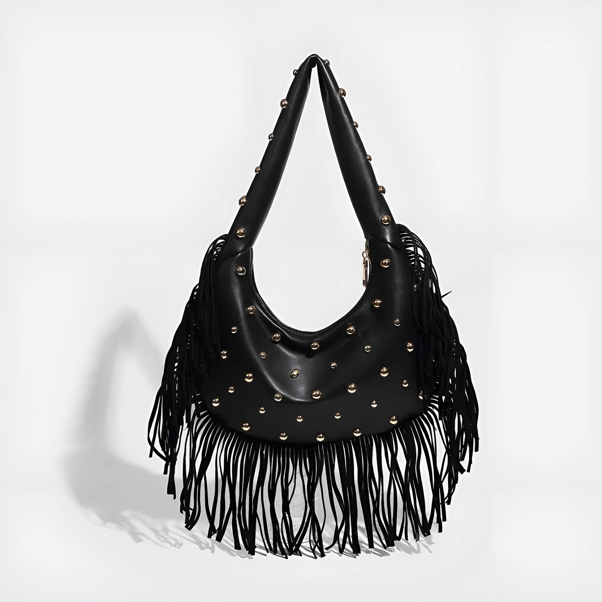 Retro black shoulder handbag with tassel detail showing internal phone compartment
