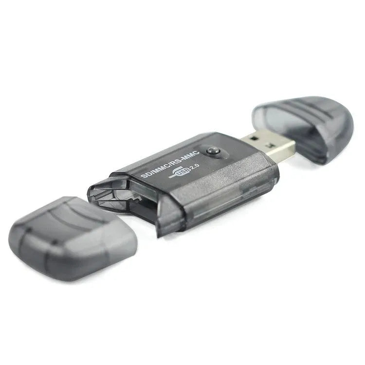 Transparent plastic USB card reader with LED lighting on computer desk