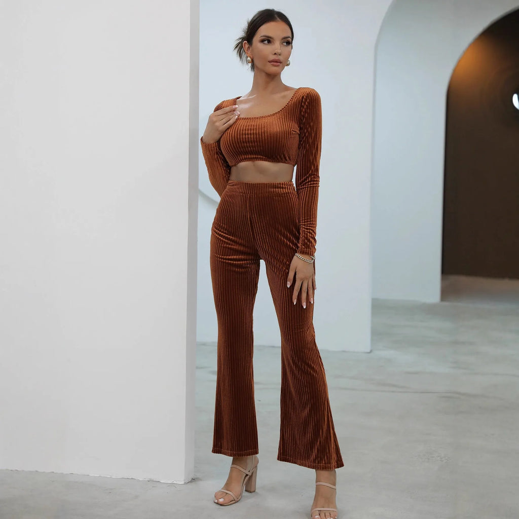 Caramel coloured women's long sleeve sweater and jogger lounge set laid flat.