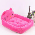 Blue cartoon-style sofa pet bed with a removable padded cushion for a small dog or cat.