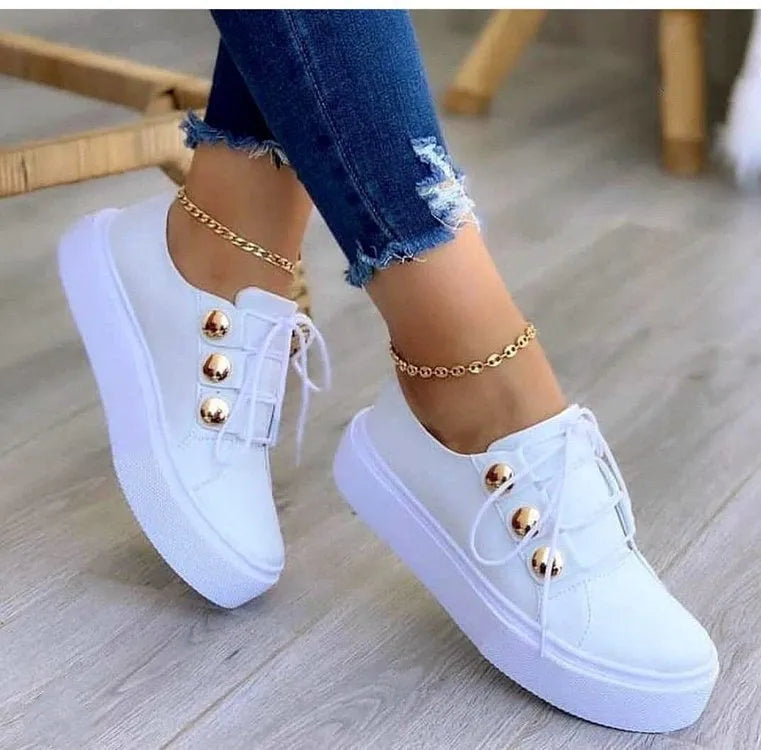 Women's white lace-up flats sneakers with rivet decoration and round toe design