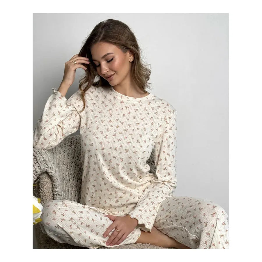 White floral print women's loungewear set with bell sleeve top and wide-leg trousers