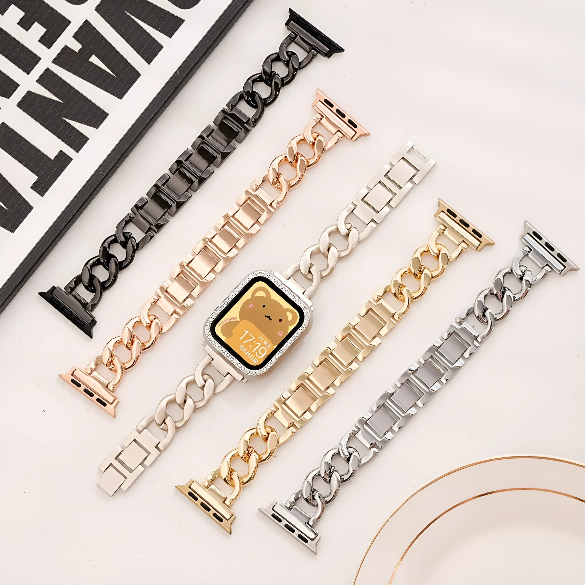 Metal denim chain replacement strap for Apple Watch in silver, black, gold, rose gold, and Starlight colours.