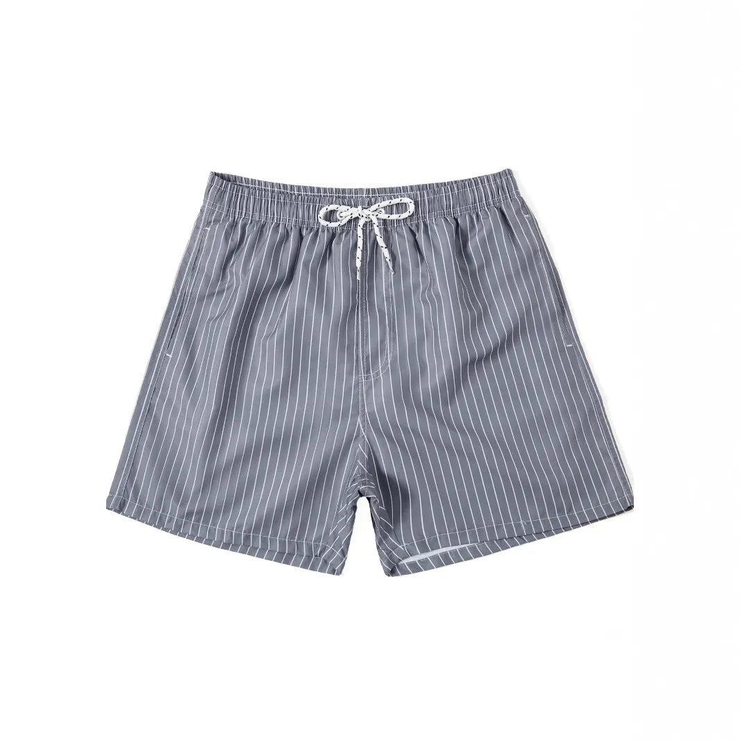 Men's striped beach shorts in polyester blend fabric, showing straight leg opening and available colour options.