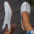 Women's closed toe wedge sandal in PU leather with a round toe and rubber wedge sole.