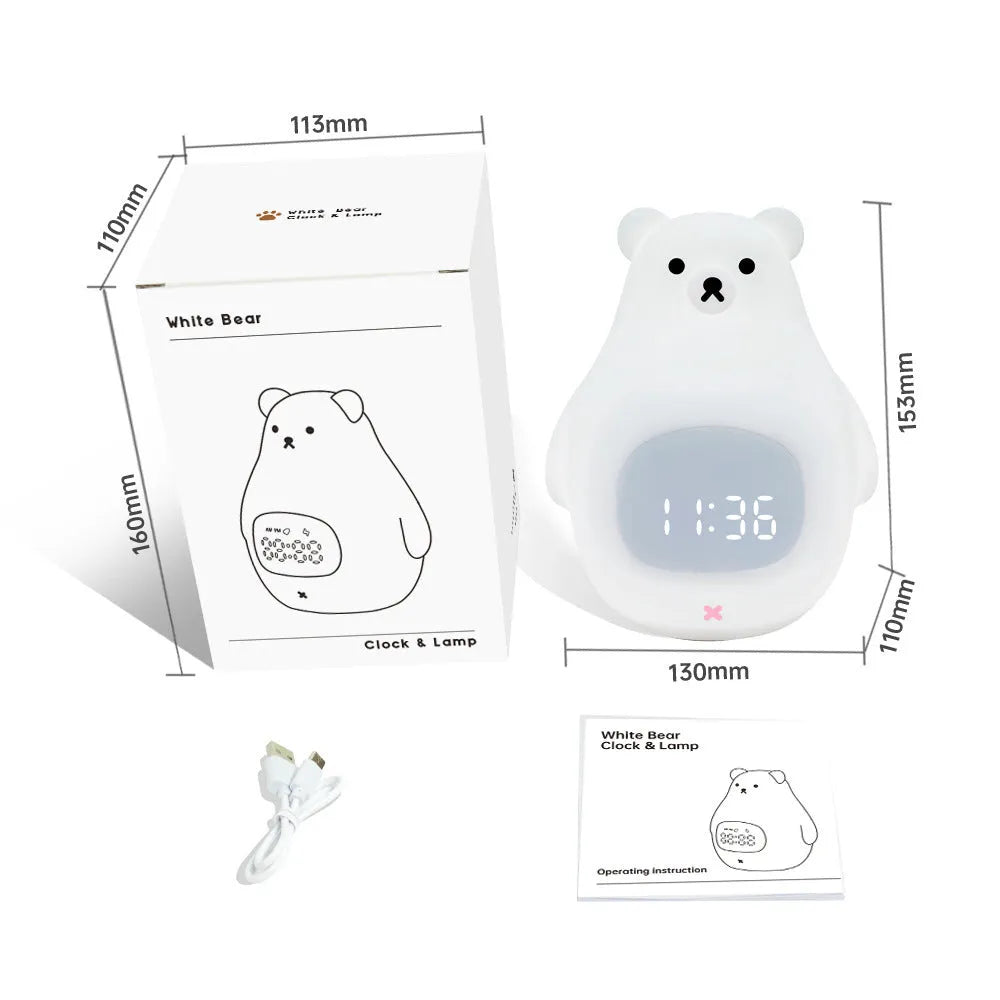 White cartoon bear silicone night light with remote control on table.