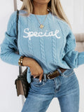 Blue crew neck pullover sweater with embroidered letters and numbers on the front.